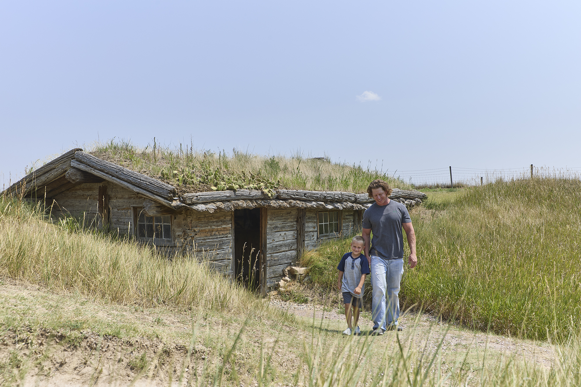 A man and son at the Museum of the Fur Trade.