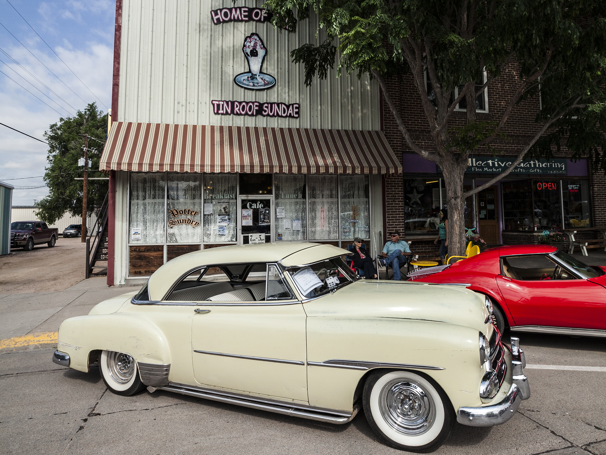 Classic cars in front of Potter Sundry.