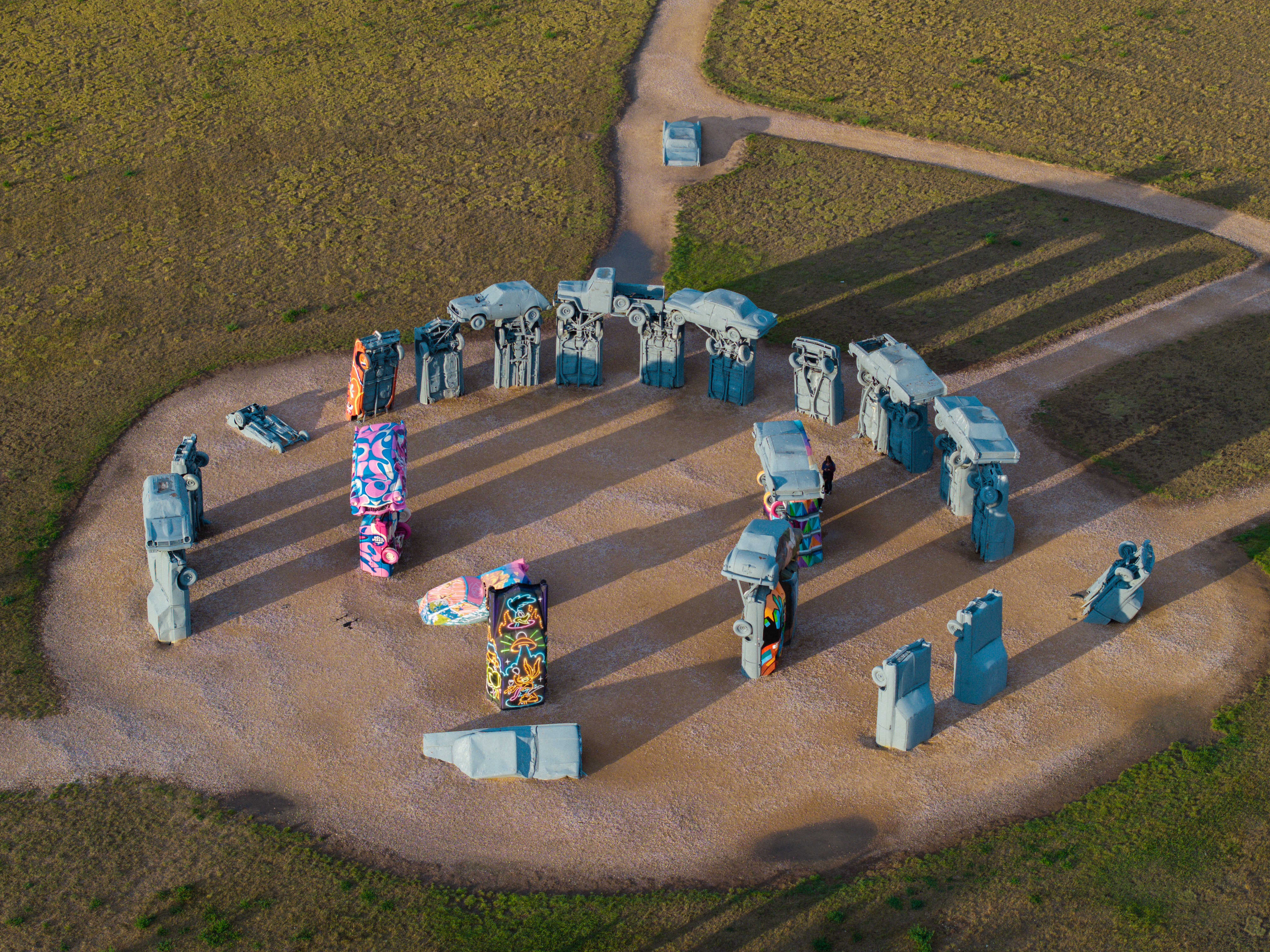 An aerial view of the spray painted cars of the famous Carhenge sculpture in Alliance.