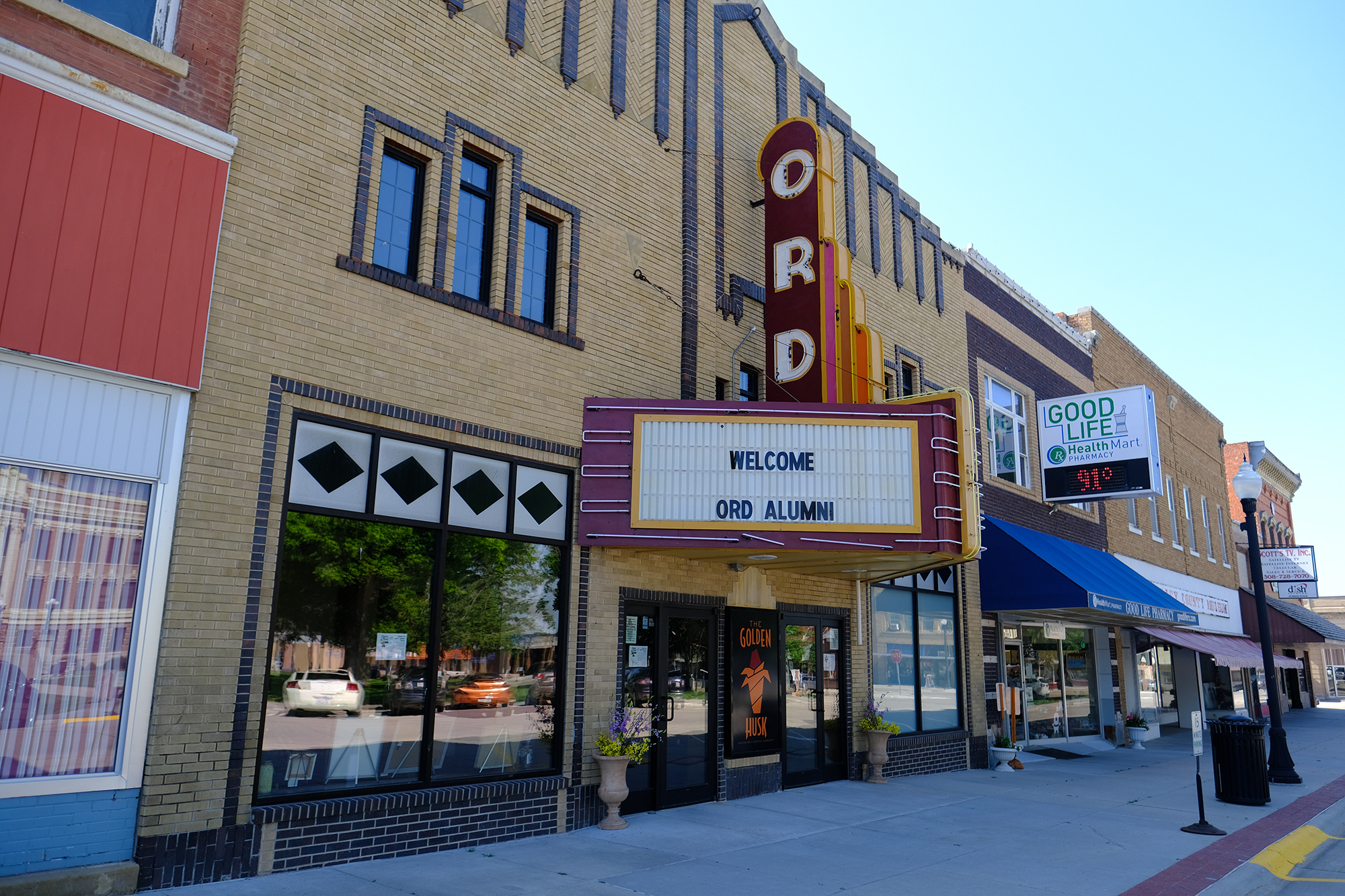 The exterior of The Golden Husk Theater with the "ORD" marquee over the entrance.