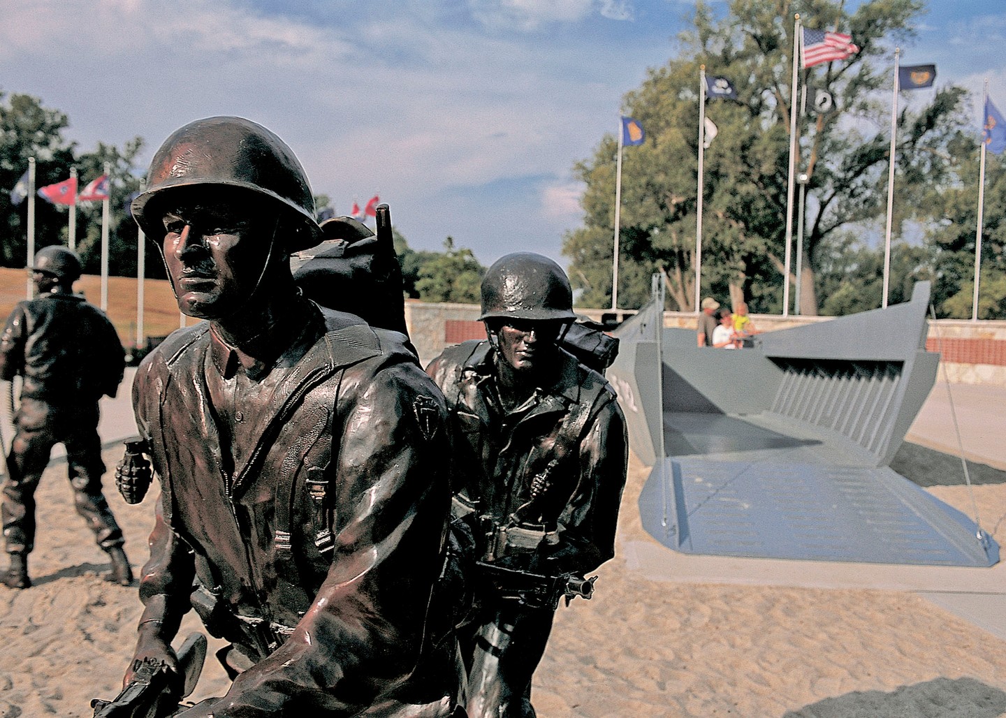 Statues of soldiers and a Higgins Boat at the Andrew Jackson Higgins National Memorial.