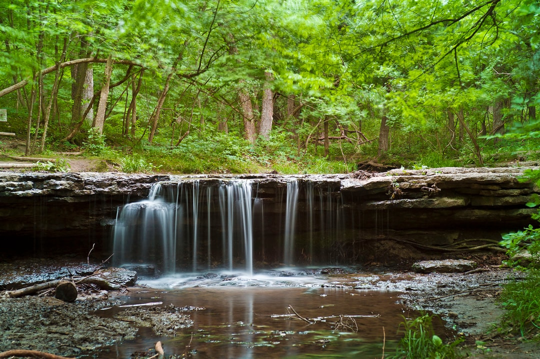 Water cascading over Stone Creek Falls at Platte River State Park in Louisville.
