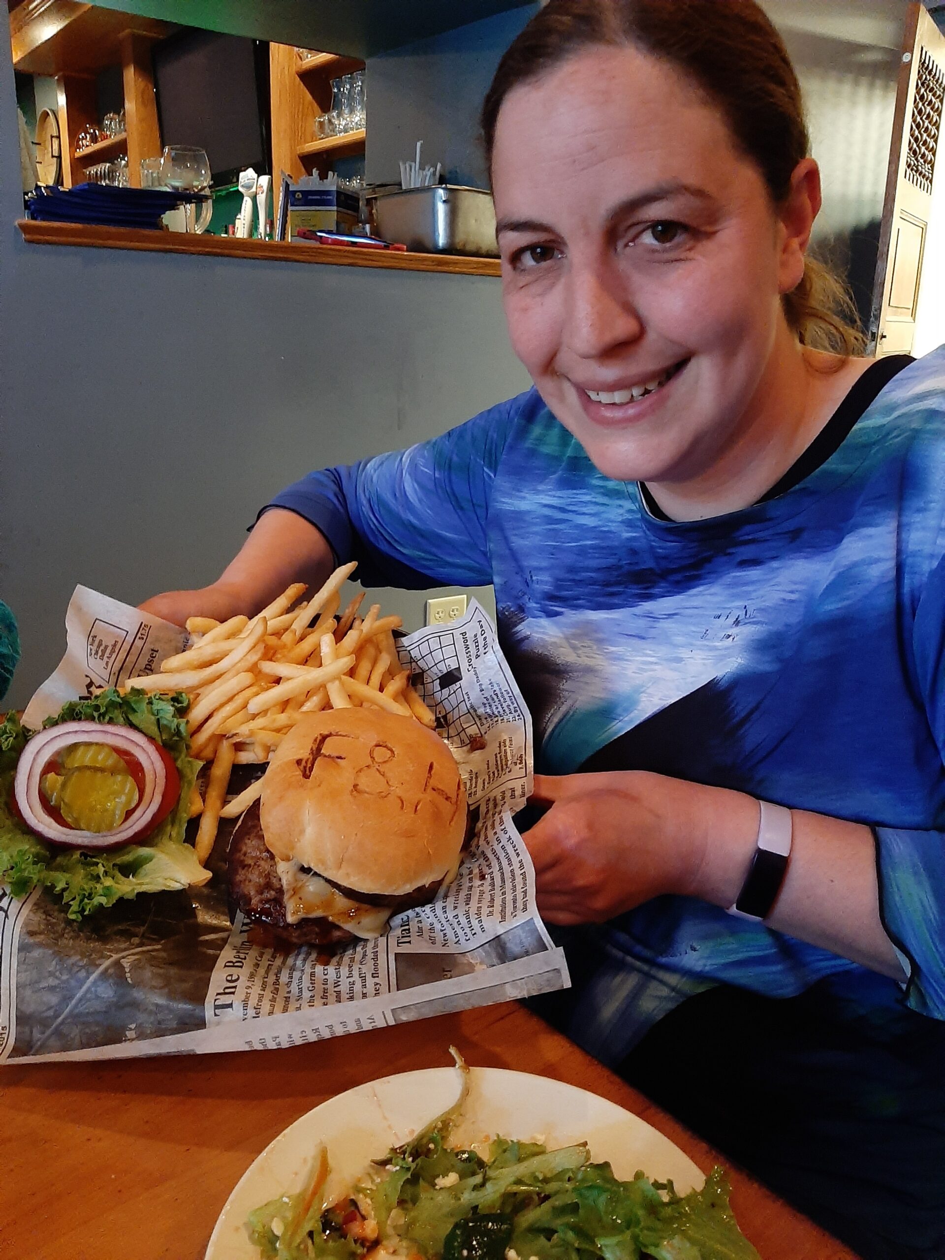 Lady Sharing Burger at stop