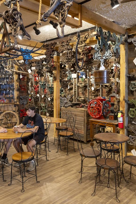 Two teens sitting at a table at the Lewis and Clark Pulley Museum and Haymarket