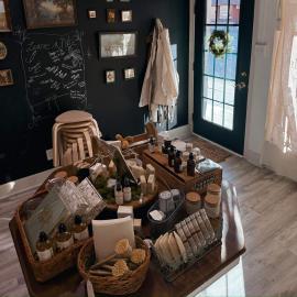 Oils, candles and more products on display.