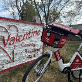 Valentine Cowboy Trailhead Park sign and bike.