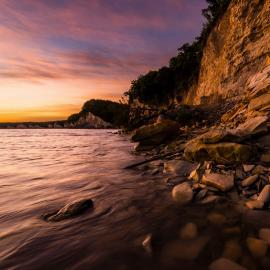 Rocky shore of lake.